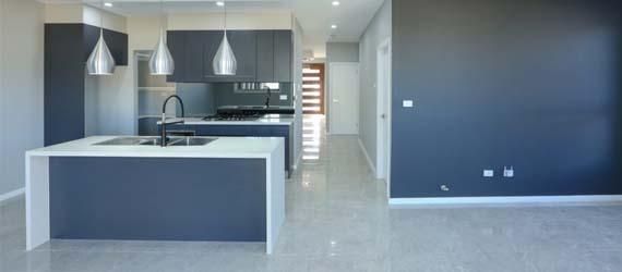 Bespoke kitchen with blue stone island